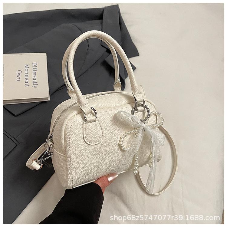 

Small bag spring 2025 new temperament portable women s bag Korean version fashion high sense simple shoulder messenger bag