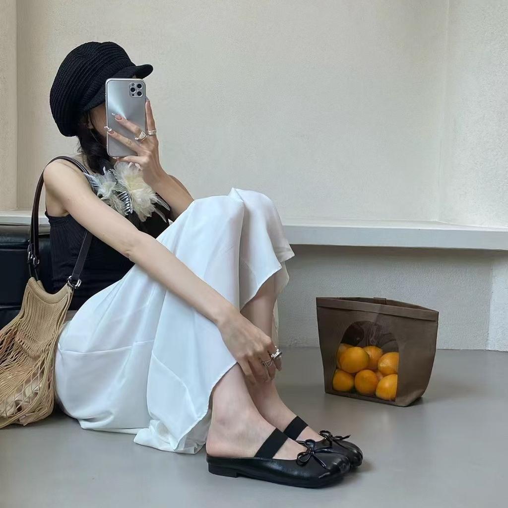 Spring and summer new cat claw head soft leather soft bottom retro casual simple half drag flat bottom one pedal cool slippers women