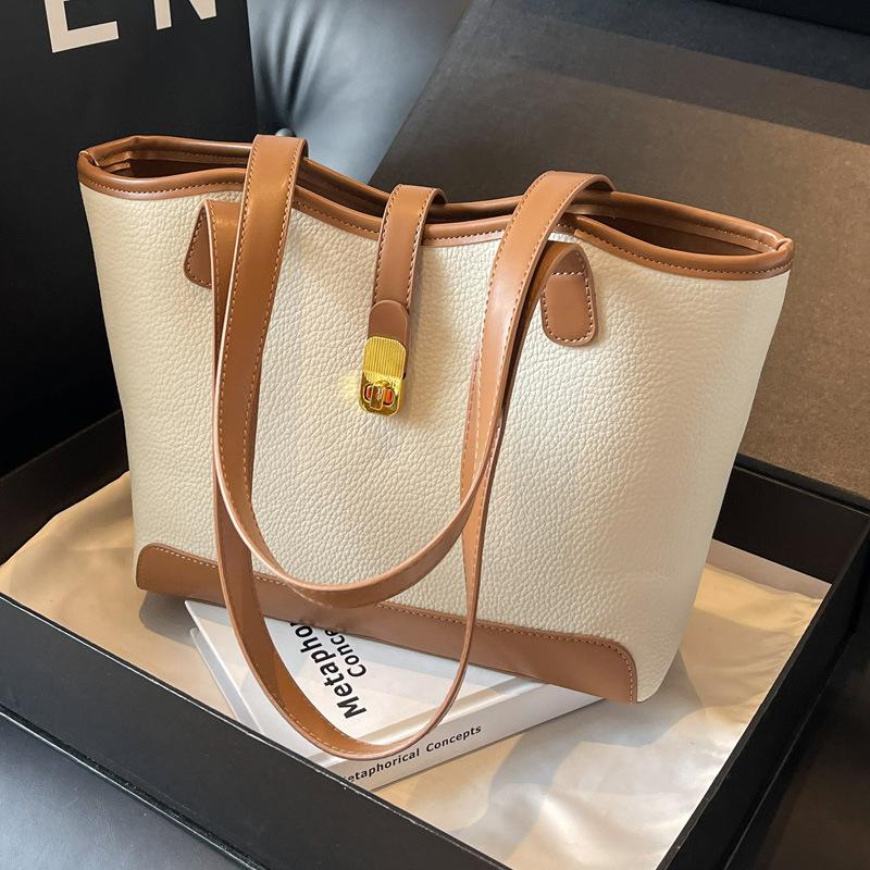 Casual tote bag women's large capacity 2025 new versatile shoulder commuter bag popular college student class bag this year