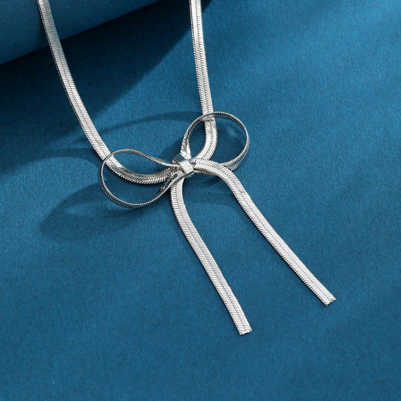 

Потрясающее золотое и серебряное ожерелье-цепочка «змейка» с бантом-бабочкой, идеально подходящее для модных женщин серебряный