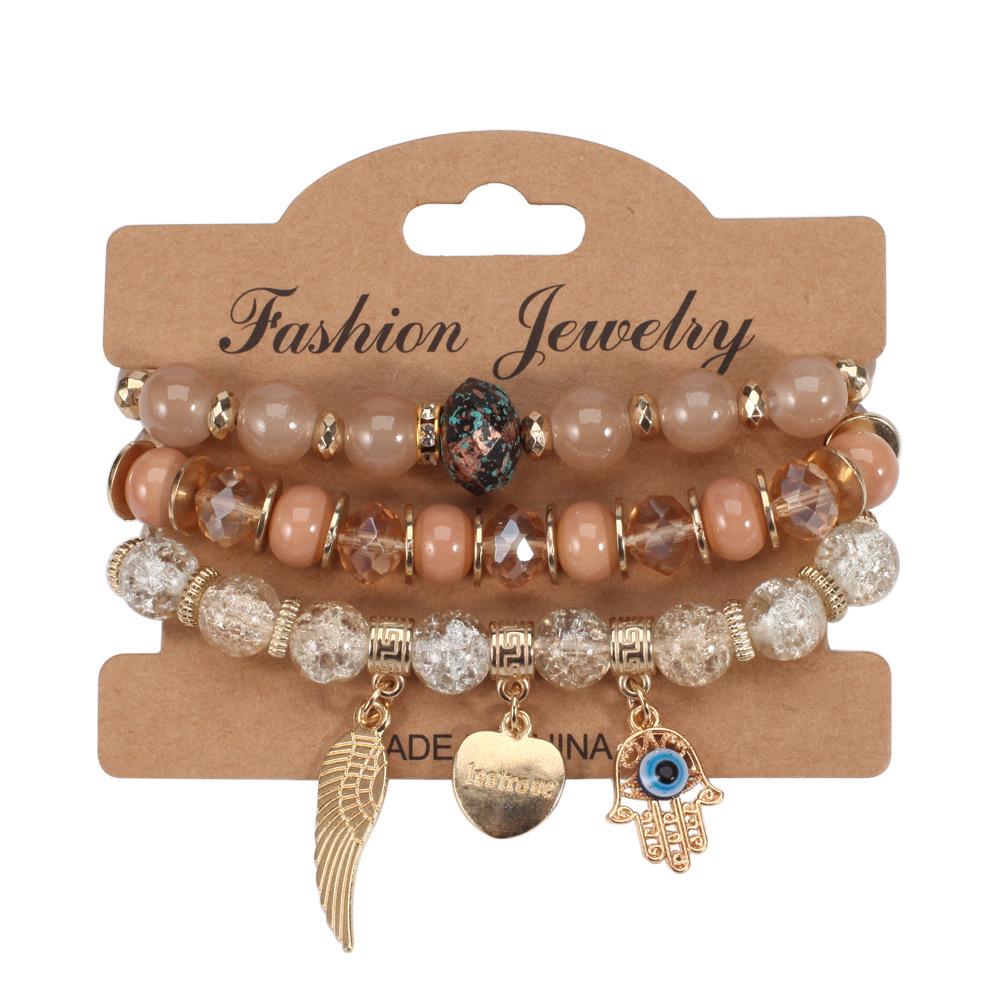 European Bohemian Beaded Bracelet with Evil Eye Wings and Heart Pendant