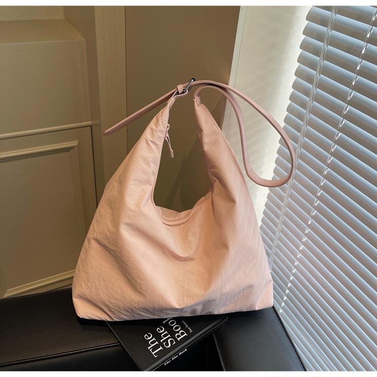 

Lazy large-capacity women s summer new casual fashion portable shoulder oblique span tote bag розовый