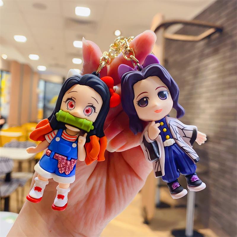 Cartoon Kreativer Geist Tötendes Schwert Dreidimensionale Figur Schlüsselanhänger Lustiger Schulranzen Anhänger Auto Schlüsselanhänger Geschenk