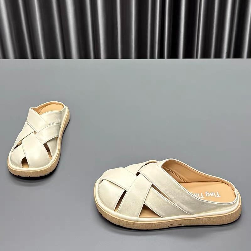 Woven French bag head slippers women's 2025 summer new flat bottom hollow fashion high sense with skirt cool slippers