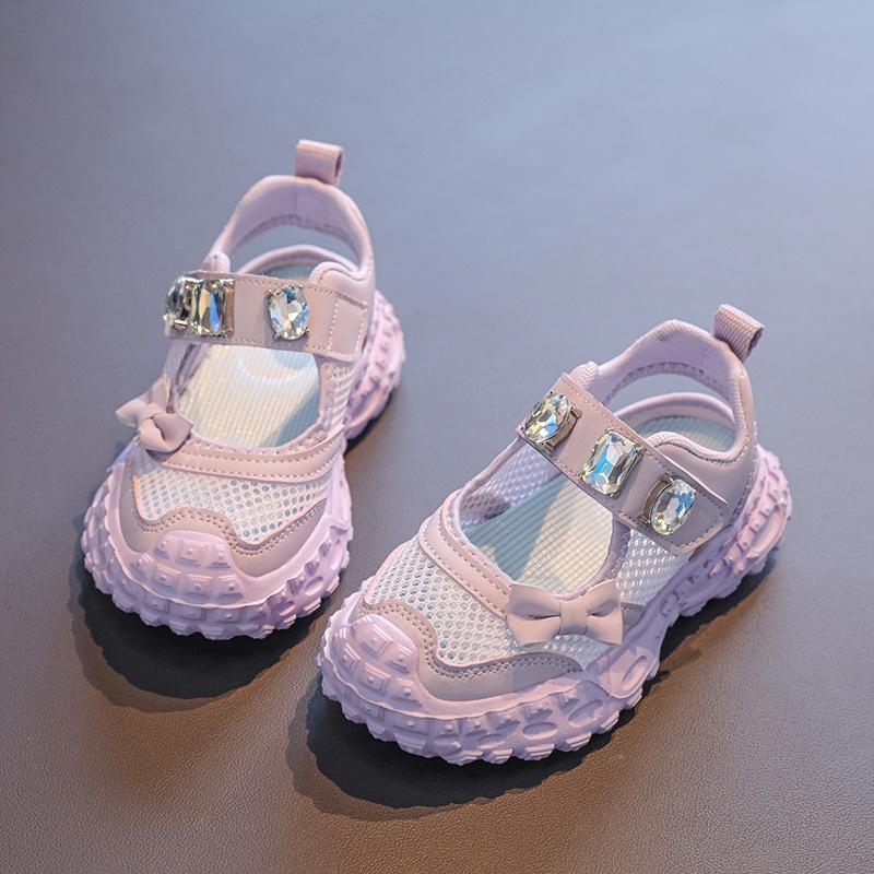 

Girls cute bowknot sports sandals with mesh for summer, little girls shoes with large rhinestones and hollow transparent mesh 31-36Code one hand6Double фіолетовий