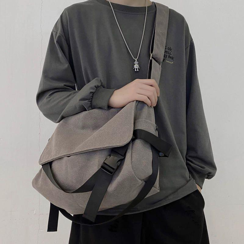 Men's Solid Canvas Crossbody Bag with Cartoon Charm Large Capacity Casual Shoulder Bag for Daily Work Commute