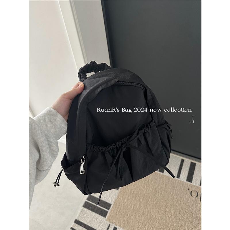 

2025 autumn on the new Korean versatile college style backpack backpack casual light nylon cute solid color travel Standard