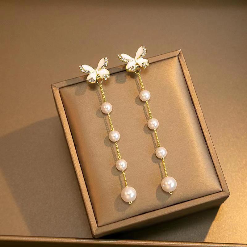 Fashion and elegance, atmospheric bow pearl earrings, women's design sense, versatile, exquisite stud earrings, sweet temperament, ear jewelry