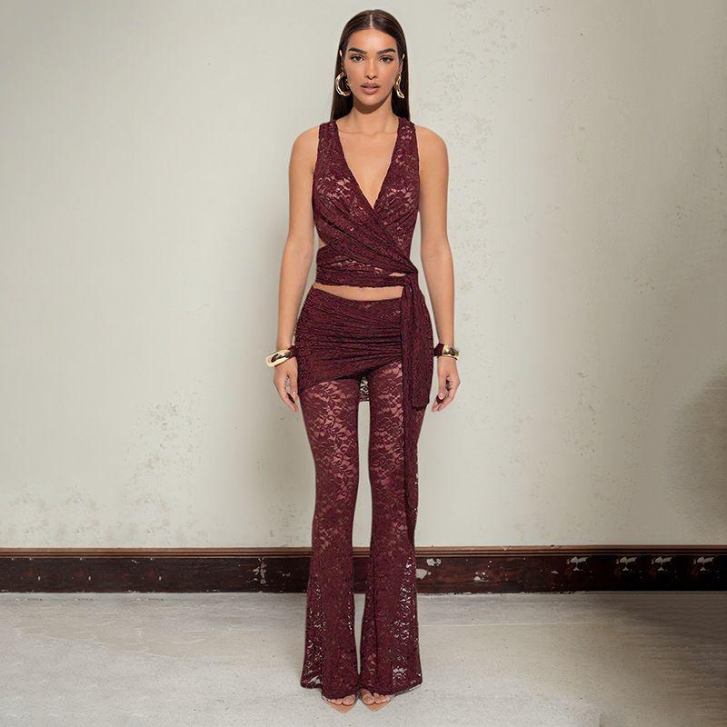 

Западный стиль Внешняя торговля Новое кружево Ажурная юбка с запахом на глубоком V-образном вырезе и пупке Плиссированные брюки-клеш Сексуальный костюм-двойка Burgundy L