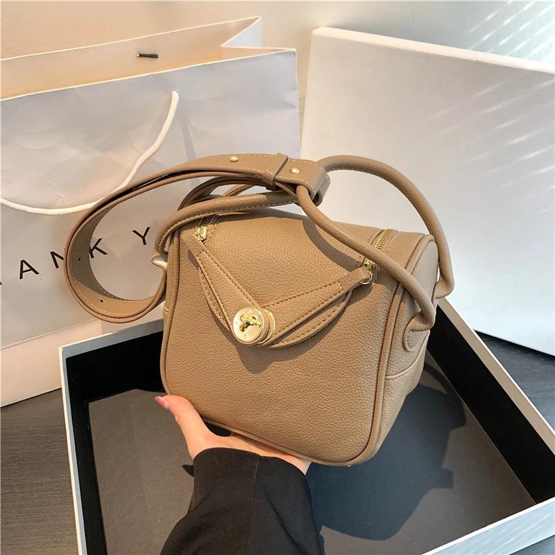 Bolso de hombro PU monocromático para mujer bolsos con línea de costura con cremallera suave   a la moda