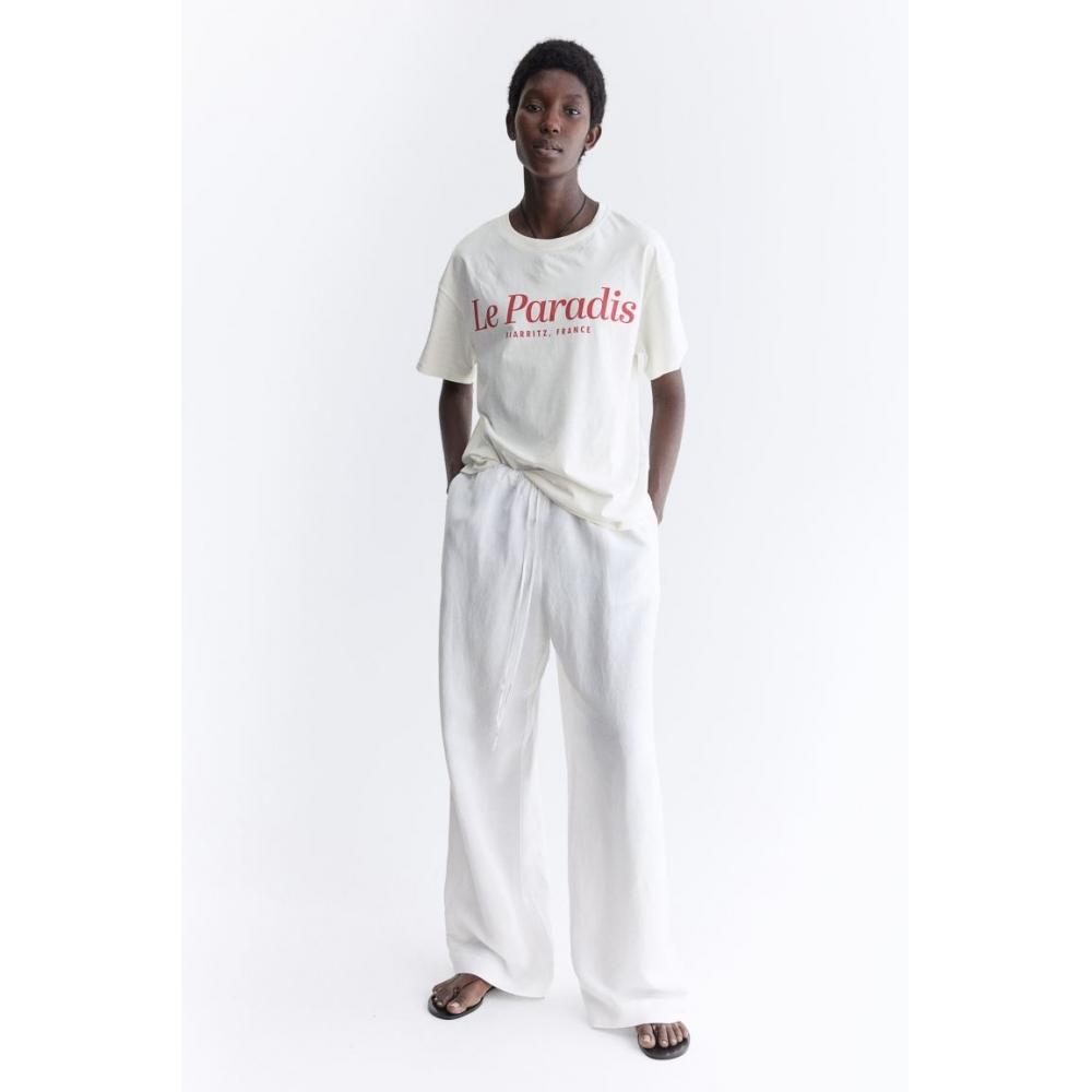 

Футболка с принтом HM белая