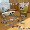 Ultra-Thin Neutral Desktop Phone Stand - Multifunctional Flip Card Design