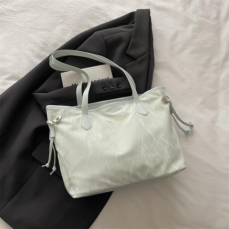 Shoulder bag to work commuter women's bag 2025 autumn new fashion niche casual simple retro hand carry tote bag women