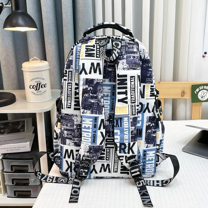 Schoolbag trendy cool graffiti boys junior high school students Internet celebrity schoolbag men large capacity fashion casual versatile backpack