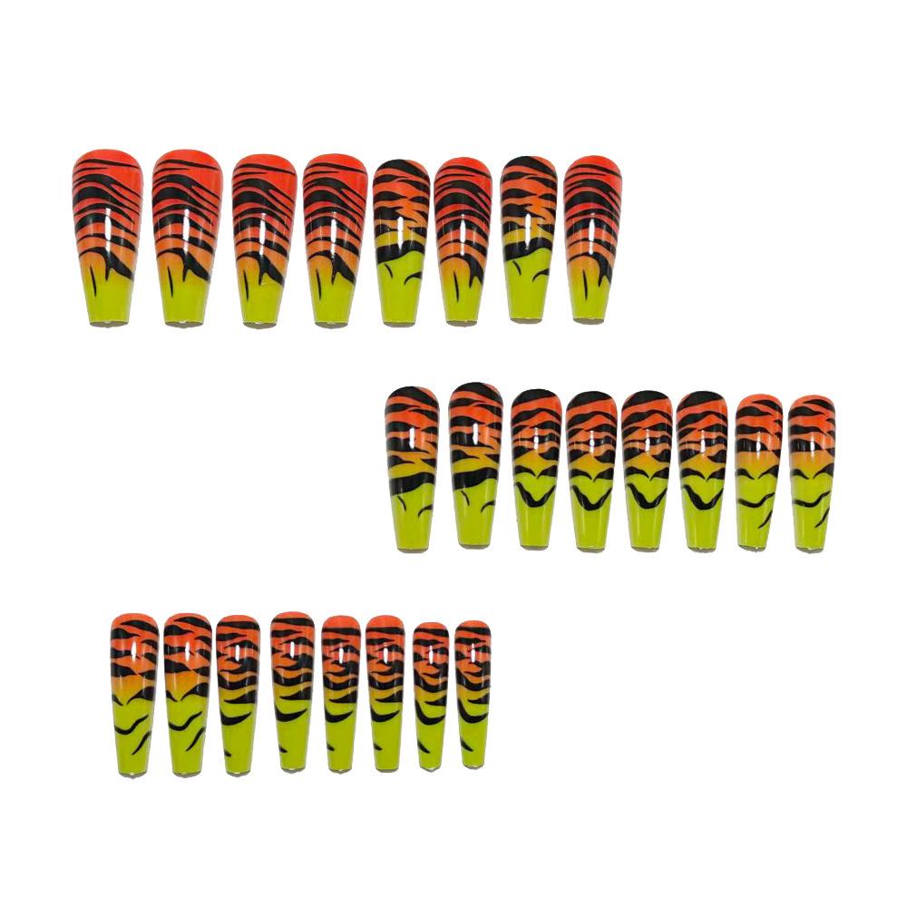 Gradient Tiger Stripe Wearable Nails - 24-Piece Set in Long Yellow-Orange.