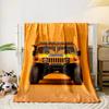 Front view of a bright yellow rugged vehicle against an orange background. for all seasons blanket lunch break throw gift