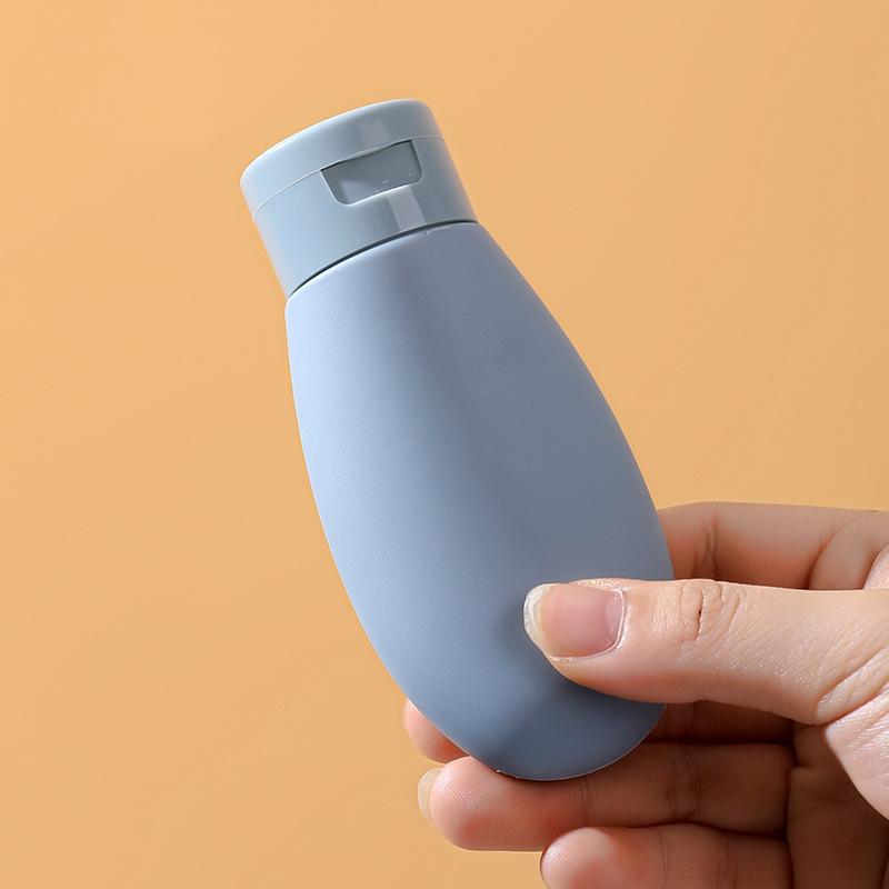 Portable 60ml Travel Dispenser Bottle for Shampoo, Shower Gel, and Facial Cleanser