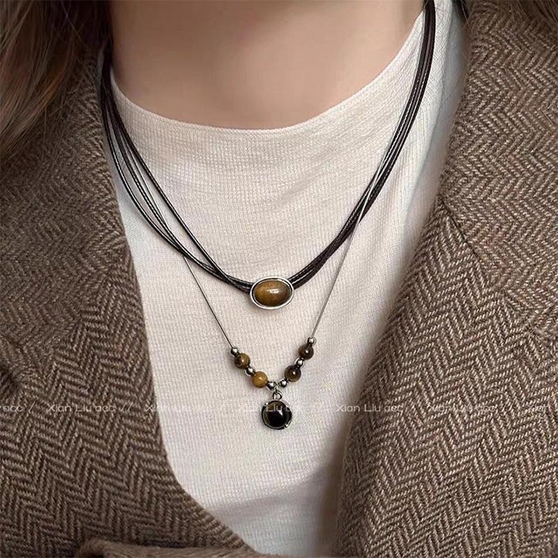 

Tiger s eye stone v-neck necklace women s retro temperament sweater chain niche stacked wearing Chinese collarbone chain sweater accessories