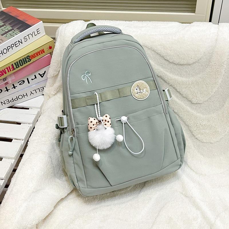 Schoolbag Elementary school bag Female junior high school student Large capacity simple campus backpack College student travel leisure backpack