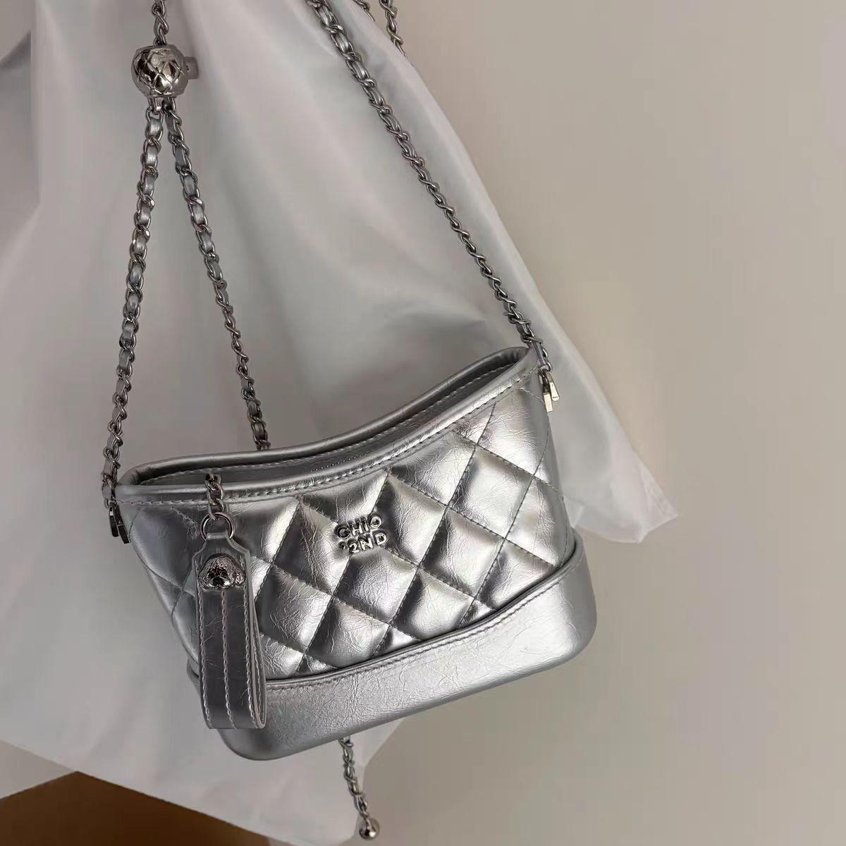 

Nanfeng versatile new bread puppy mashed taro Bobo diamond stray bag women s chain bag shoulder messenger bag серебряный