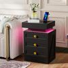 Bedside table, three drawers, with charging station, 2 AC power outlets/2 USB ports, European standard plug, black.