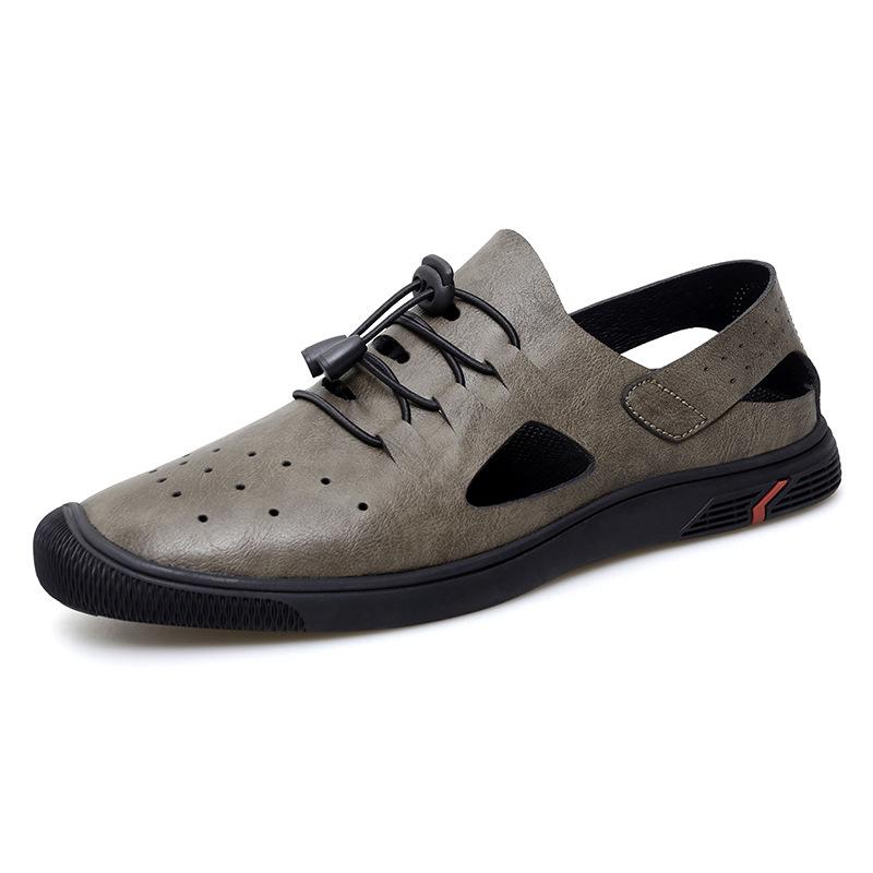 

2025 spring and summer new fashion trend bag head cover foot hollow hole leather shoes summer men s outdoor leather sandals 45