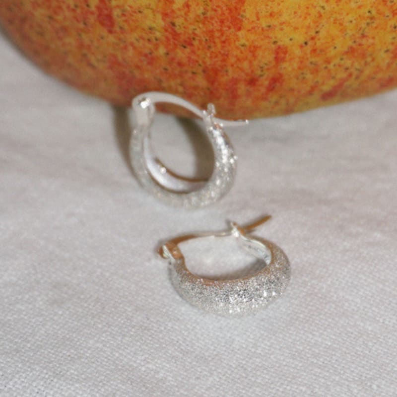 OURPIERRE GRANITO ROUND EARRING SILVER