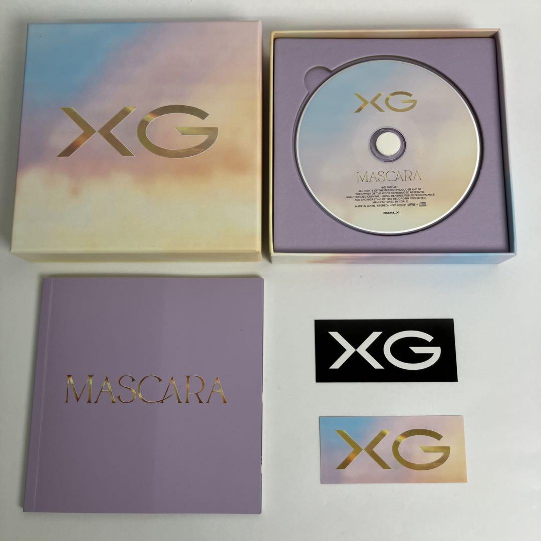 

[БУВШИЙ У ВЖИВАННІ] Лімітований XG MASCARA буклет CD-альбому з 2 наклейками