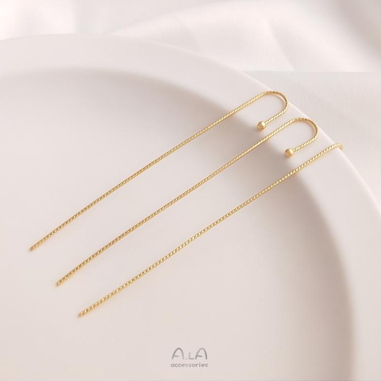 

Сережки-пусети з кубічного цирконію з покриттям із золота 14 каратів з манжетом на вухо у стилі кончі