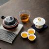 Ceramic travel tea set, one pot, three cups of Kuaike cup, outdoor round road car portable camping Kung Fu tea set