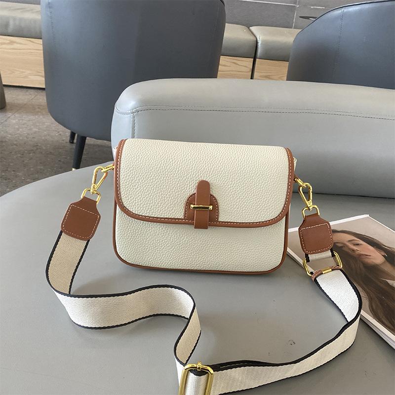Leather women's bags, high-end first-layer cowhide contrasting color shoulder square bag, new summer women's messenger bag bag.