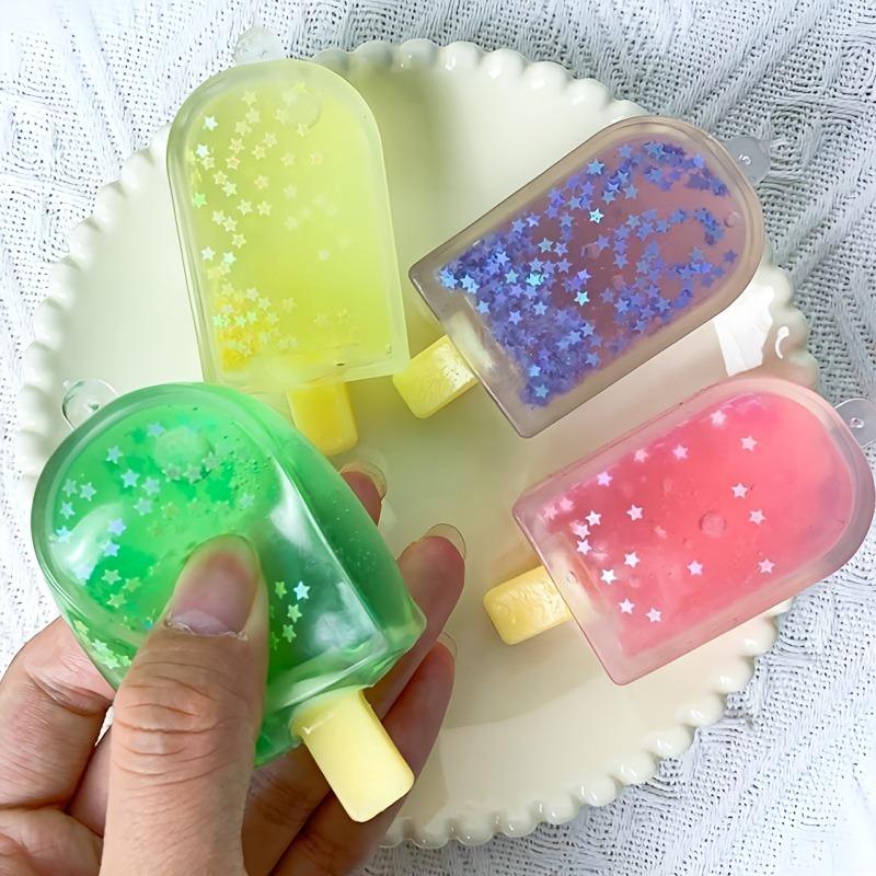 Taba Squishy Glitzer Eis am Stiel Fidget Squishy Mini Eiscreme Fake Food Squishy Angstlöser Stressabbau Entlüftungsspielzeug Entspannendes Geschenk