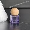 High-End Light-Blocking Glass Roller Bottle with Wood Cap for Perfume and Essential Oils - Small Refillable with Flower Water Applicator.