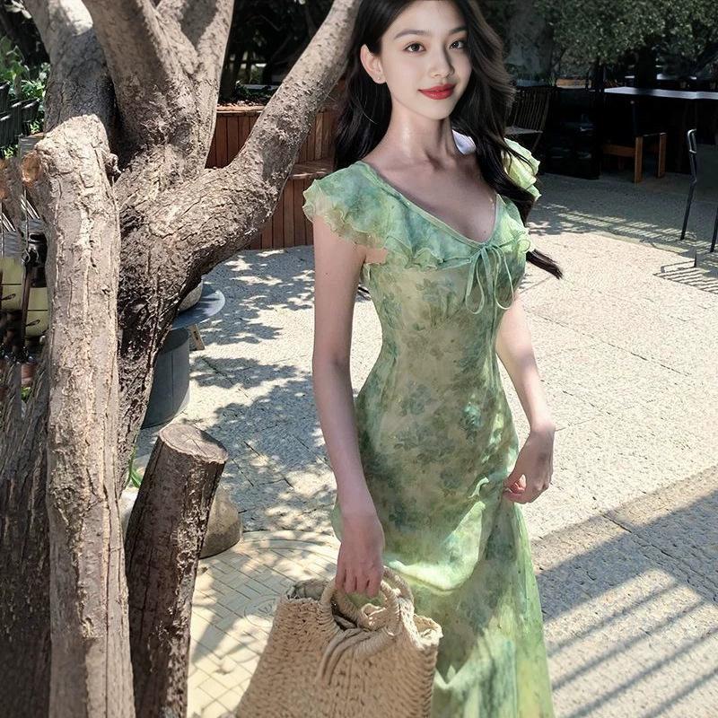 Seaside vacation green floral small flying sleeve dress gentle temperament unique beautiful waist beach dress