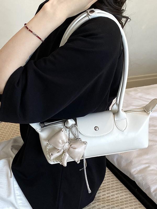 2026 French Light Luxury Cowhide Long Handle Dumpling Baguette Crossbody Bag