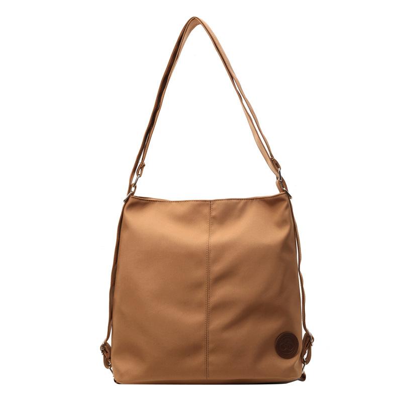 

Handheld women s bags are fashionable and simple, large-capacity tote bags, shoulder bags, commuter bags. світло-коричневого кольору