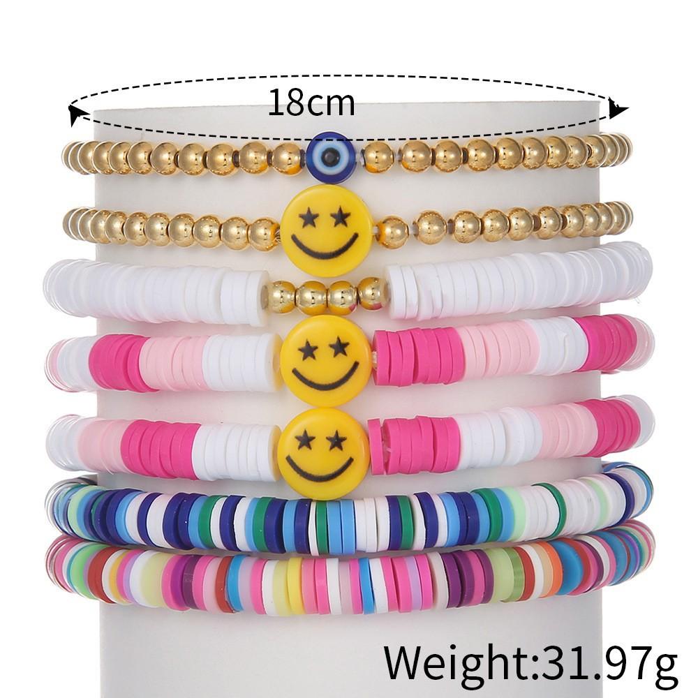 Korean version of fashion new multi-layer elastic thread soft pottery love smiley face bracelet set retro handmade pearl jewelry women