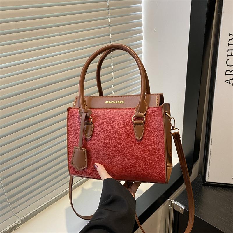 New beautiful contrasting color design sense niche atmosphere high texture women's handbag versatile shoulder messenger bag