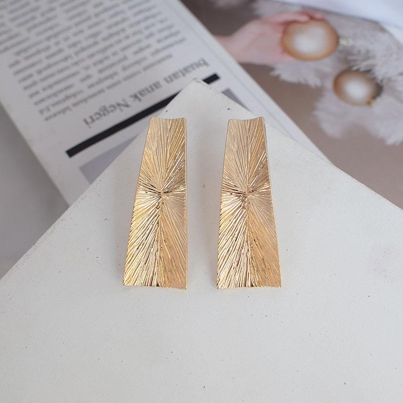 European Fashion Twisted Long Dangle Earrings - Stylish Women s Statement Jewelry