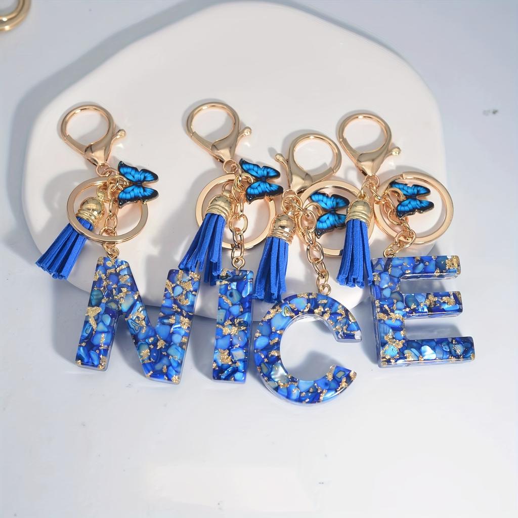 1pc Custom Blue Alphabet Letter Keychain with Butterfly Pendant Resin Ladies Key Ring with Tassel - Elegant Accessory for Bags Backpacks
