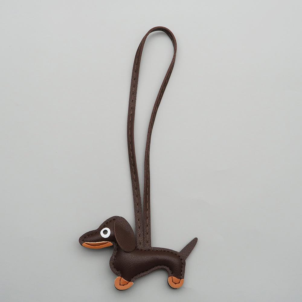 

Доступный: Милый кожаный брелок-подвеска в виде таксы - Универсальный для сумок, автомобилей и пар