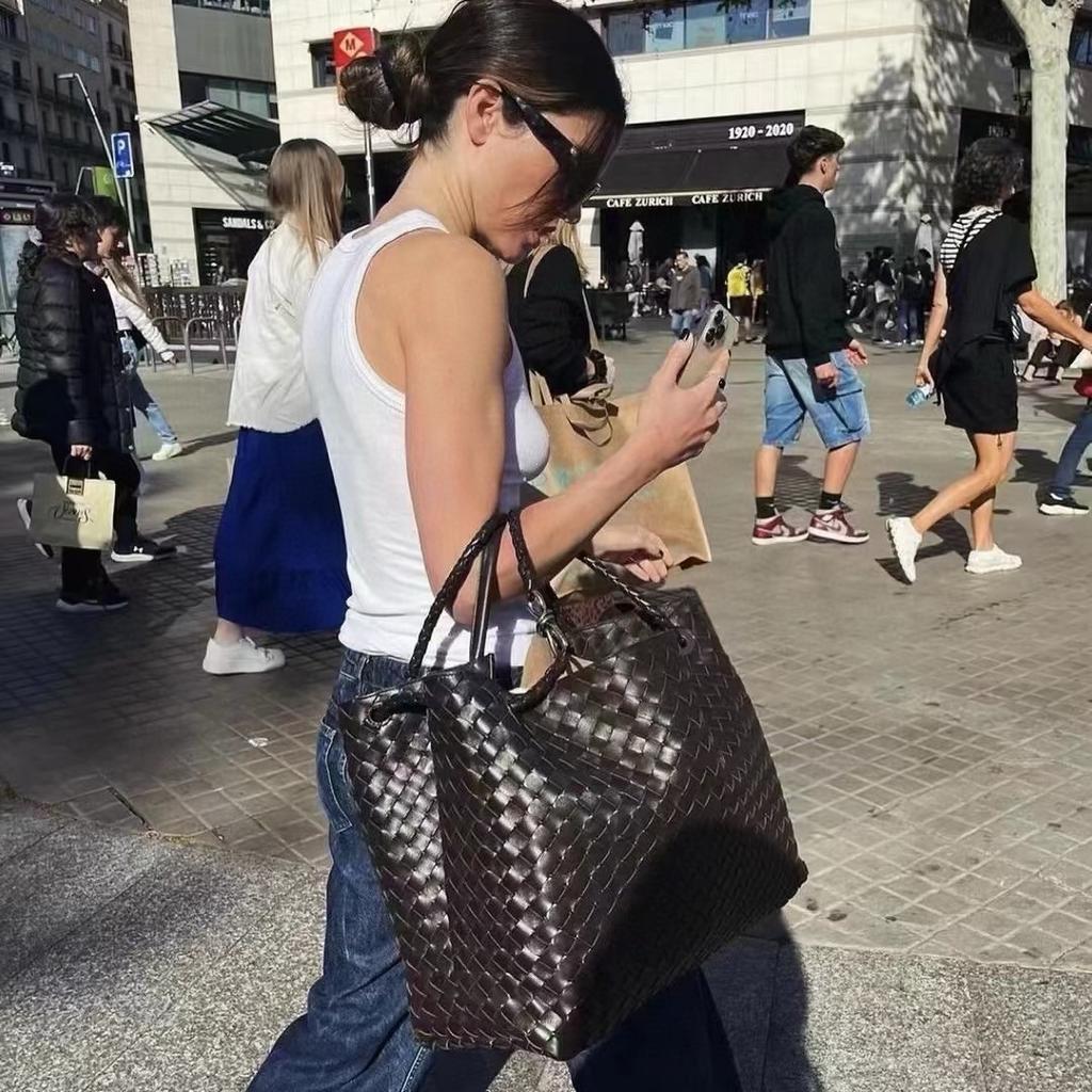oversized bow metal rope buckle cowhide woven bag women's autumn and winter new leather large-capacity handbag