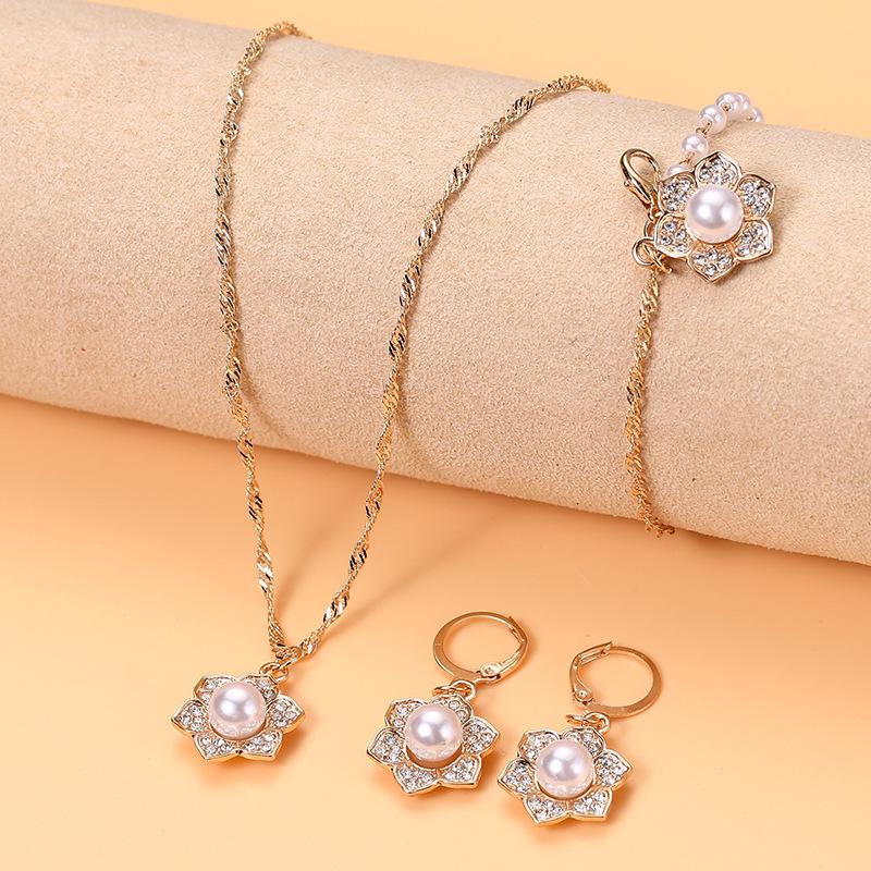 

Double Layer Pearl Bracelet & Rhinestone Flower Clasp Earring Set for Women - Light Luxury Sweet Style Jewelry.