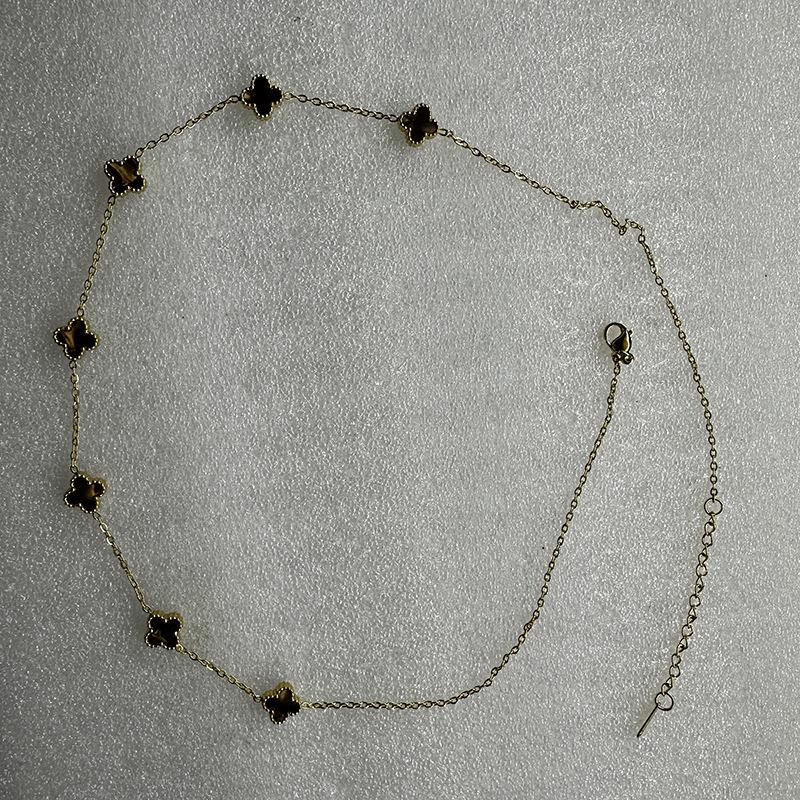 

Ожерелье 9 мм «Счастливая семерка» с четырехлистным клевером, золотой чокер 18 карат с красным халцедоном, агатом и белым перламутром. 18K