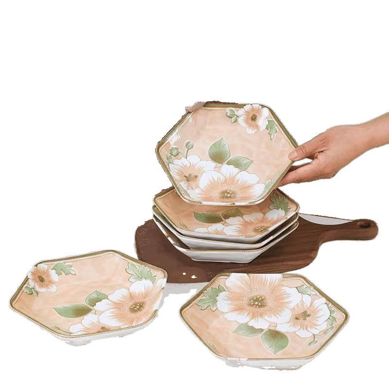 Kamelie Sechseckiges Teller- und Schüsselset: Elegantes rautenförmiges Design