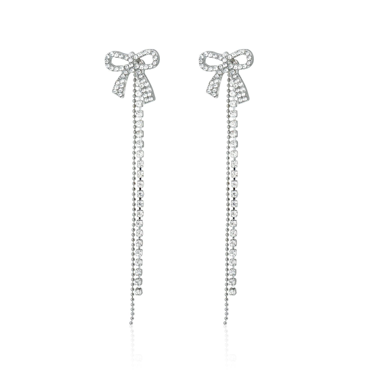 Full diamond bow earrings, long fringed chain earrings, thin earrings.