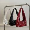 Internet celebrity armpit bag ladies 2025 new Korean version of fashion niche shoulder bag personalized rivets hand carry dumpling bag pu