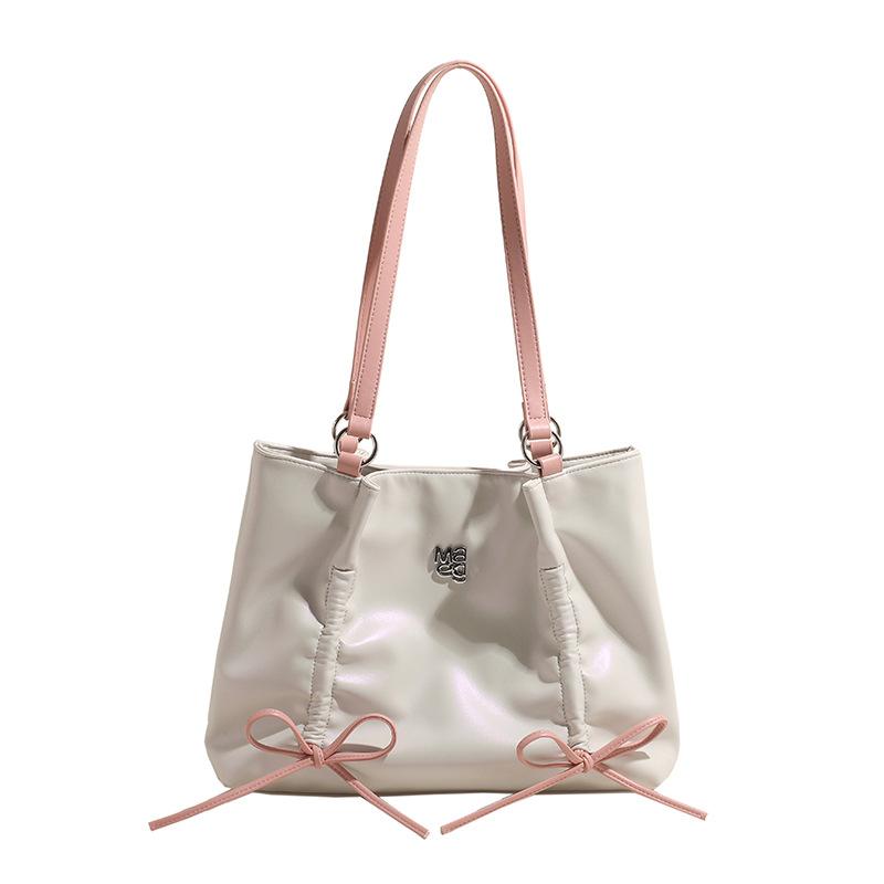 

Fashion color matching large-capacity tote bag women s new woven bow shoulder bag commuter armpit bag