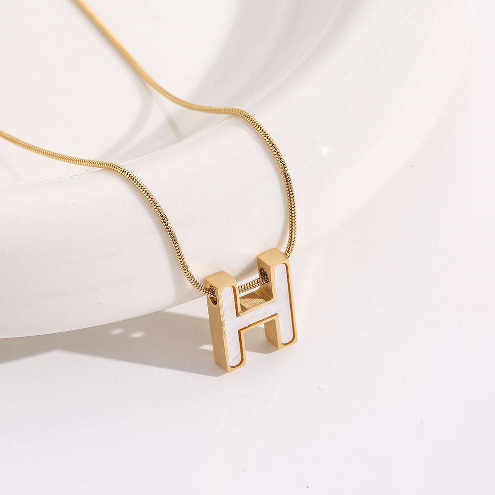 Elegant 18K Plated Titanium Steel Cross Necklace for Women - Light Luxury Clavicle Chain That Resists Fading