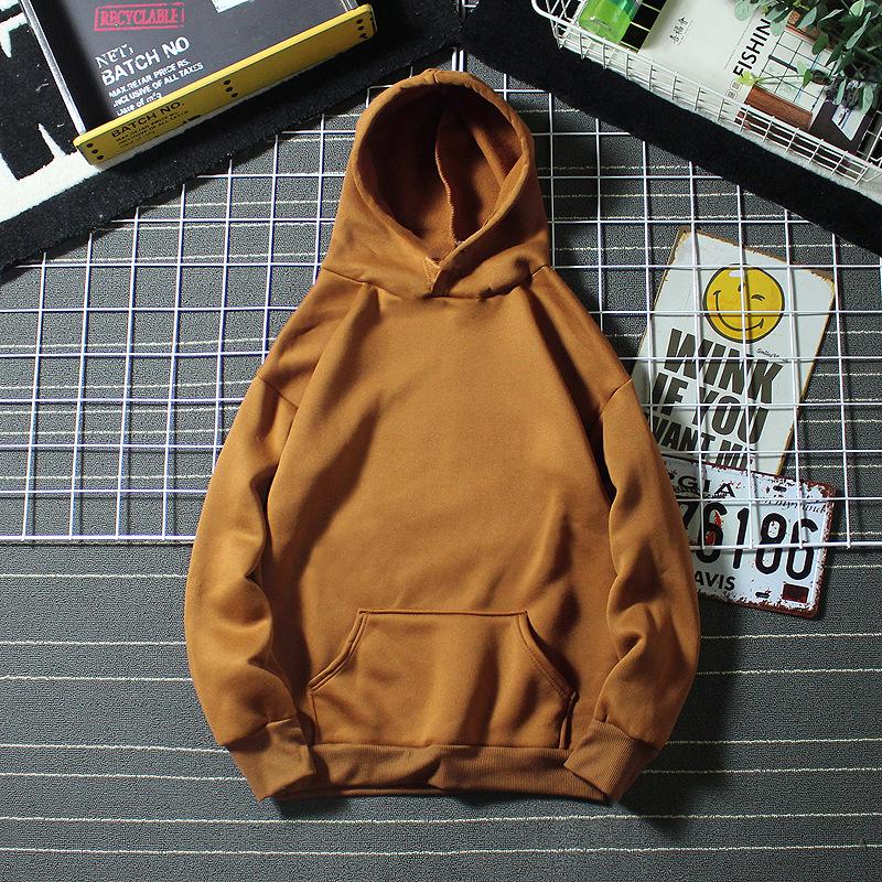 Primavera e outono nova moda feminina cor sólida com capuz bolso manga comprida camisola casual solto topo